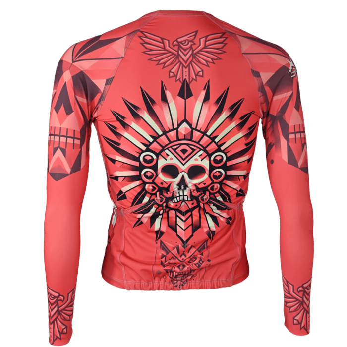 Jersey Ciclismo Día de muertos 2024 Parte trasera del jersey de ciclismo con diseño de calavera y penacho, representando la conexión con los ancestros en la celebración del Día de Muertos. En la versión 'Aero', su corte corto evita arrugas, mientras que la versión 'Regular' ofrece un ajuste cómodo con 4 bolsillos en la parte posterior, uno con cierre. Ideal para ciclistas que valoran el estilo, la funcionalidad y el simbolismo cultural en sus prendas.